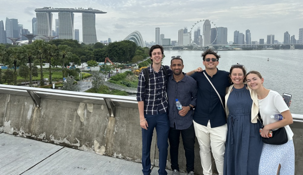 BAL students in  Singapore standing in front of the cityscape