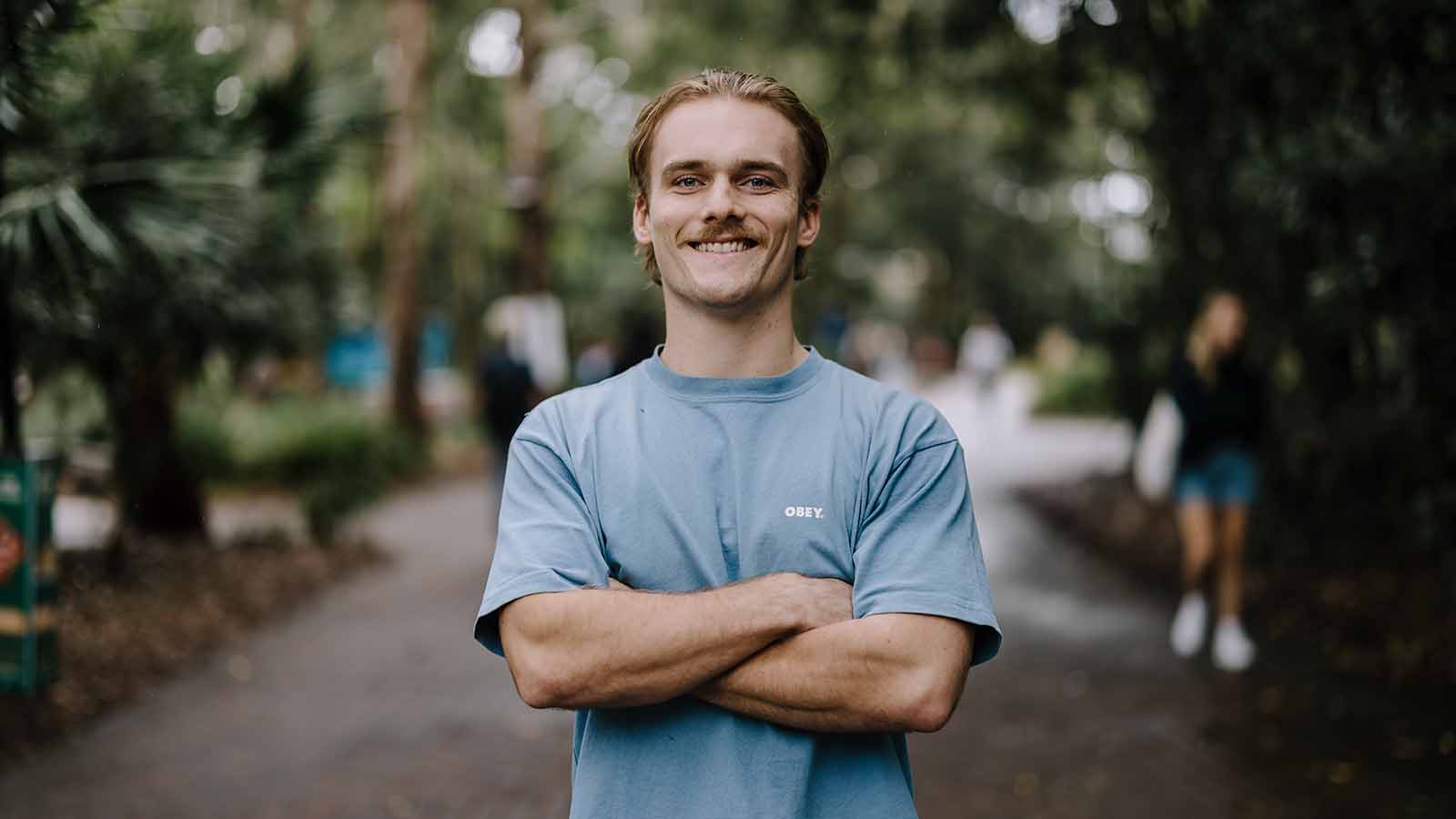 UOW environmental science student Jesse on the Wollongong campus.