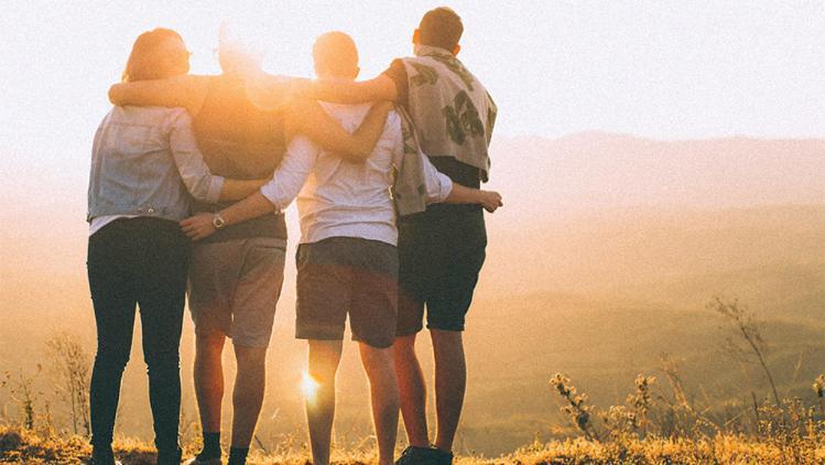 Image of a group of students hugging