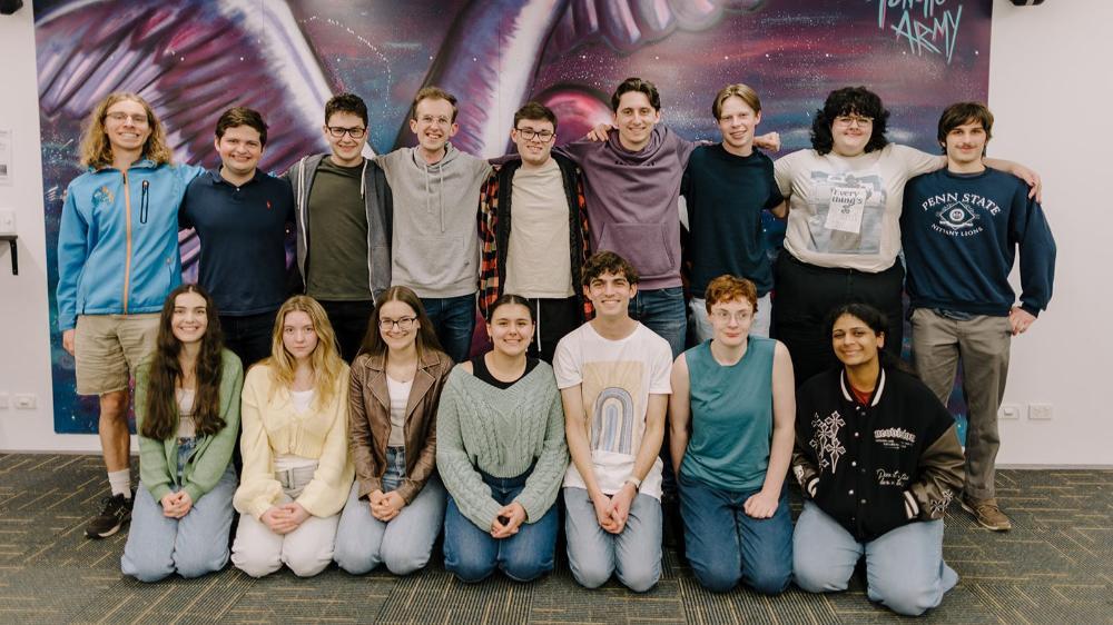 A group of students from the UOW Debating Society smile at the camera for a group photo during an internal club meeting. Photo: Michael Gray