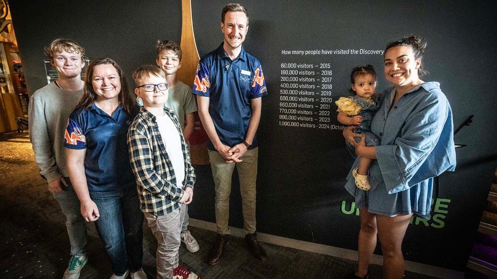 Aidan Vardy, Professor Lisa Kervin, Lochie Vardy, Owen Vardy and Josef English with Addison and Rachel Micallef at the plaque to commemorate the event. (15) and  (11)