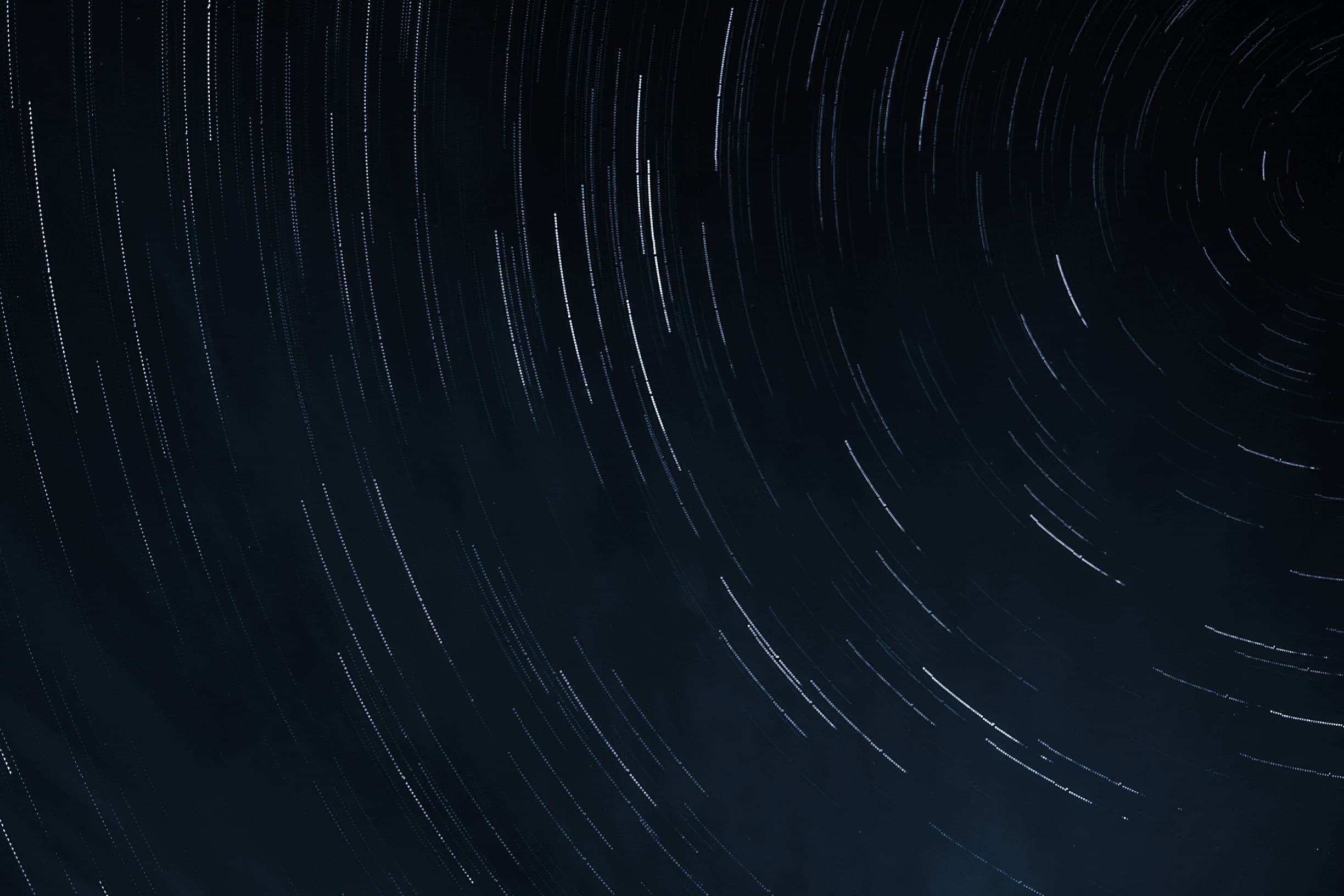 A generic image of flashing lines in space, against a black background. Photo: Unsplash